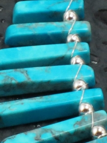 Turquoise wire wrapped with Sterling Silver